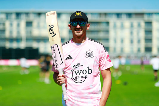 Limited edition Pink 4 Syd Zaman Akhter shirt (Large), plus a signed Kookaburra bat